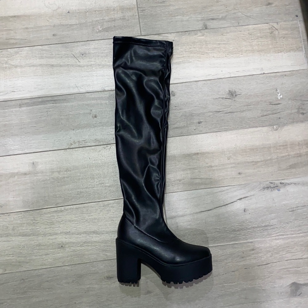 Thigh high leather boots